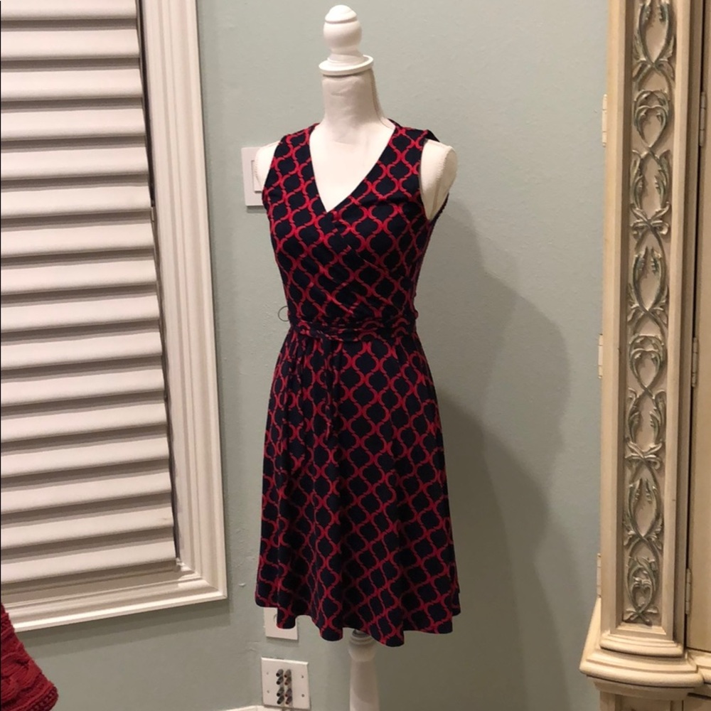 This is blue and red sleeveless mid length dress